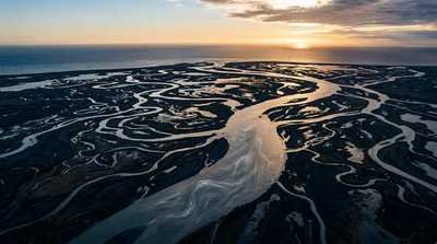 Tethys, the Titan goddess of nourishing waters, an aerial view of a river delta